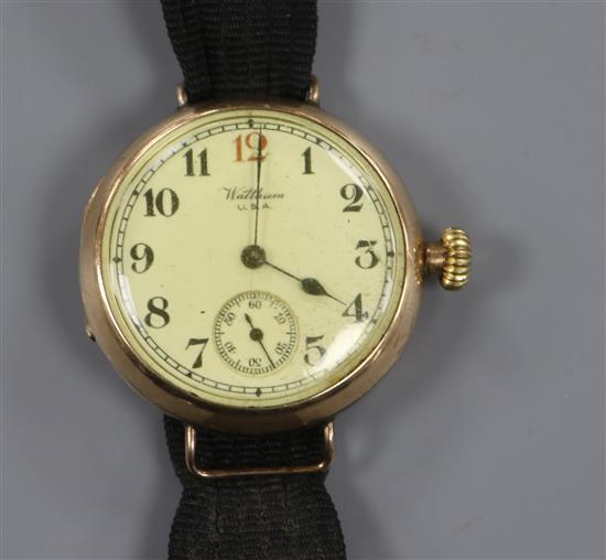 A gentlemans early 20th century 9ct gold Waltham manual wind wrist watch.